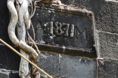 Inscription on the Stone Ruins of the Antoinette Sugar Factory showing Date of its Construction